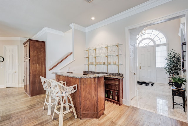 128 Country Club Dr, Heath, TX 75032 - indoor bar with crown molding, light wood-style floors, and recessed lighting