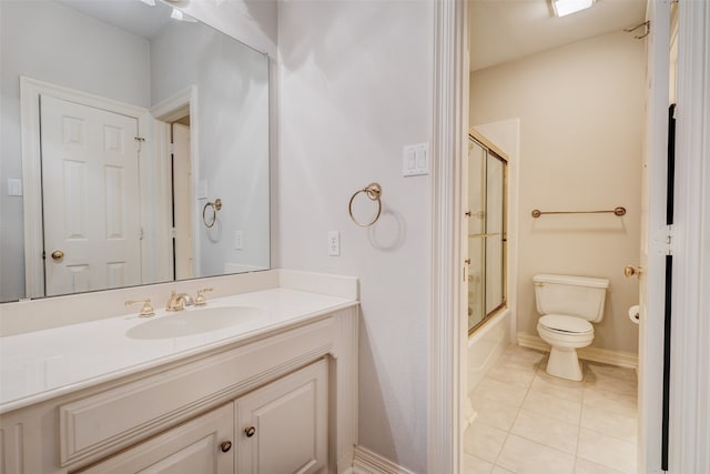 128 Country Club Dr, Heath, TX 75032 - bathroom featuring vanity, tile patterned flooring, and bath / shower combo with glass door