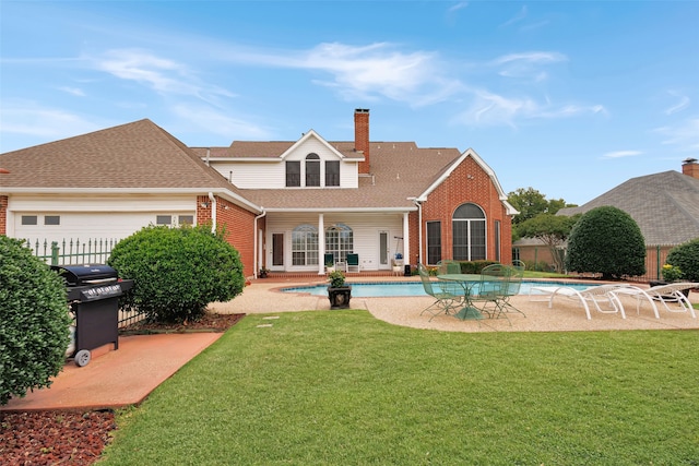 128 Country Club Dr, Heath, TX 75032 - rear view of property with brick siding, a chimney, and a patio