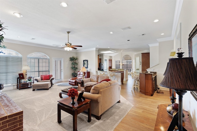 128 Country Club Dr, Heath, TX 75032 - living room with recessed lighting, a ceiling fan, crown molding, and light wood-style floors