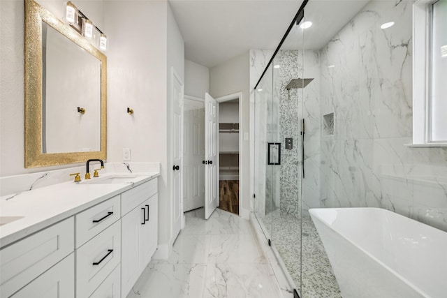 15578 Wrangler Dr, Frisco, TX 75035 - full bathroom with a marble finish shower, marble tiled floors, a freestanding bath, double vanity, and a spacious closet