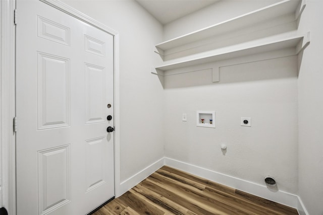 15578 Wrangler Dr, Frisco, TX 75035 - washroom with electric dryer hookup, hookup for a washing machine, dark wood-type flooring, and hookup for a gas dryer