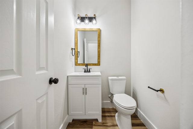 15578 Wrangler Dr, Frisco, TX 75035 - bathroom featuring wood finished floors and vanity