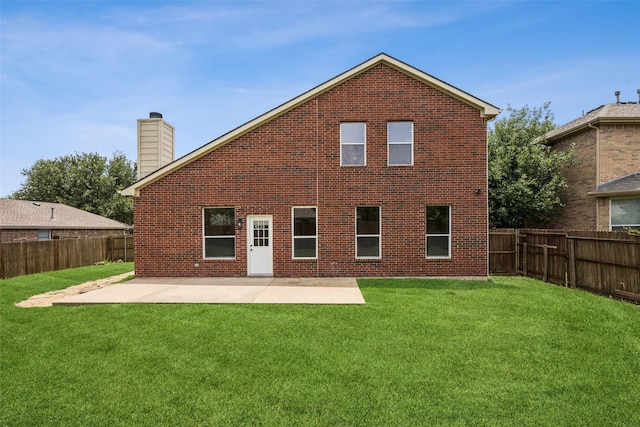 15578 Wrangler Dr, Frisco, TX 75035 - rear view of property with brick siding, a chimney, a fenced backyard, and a patio area