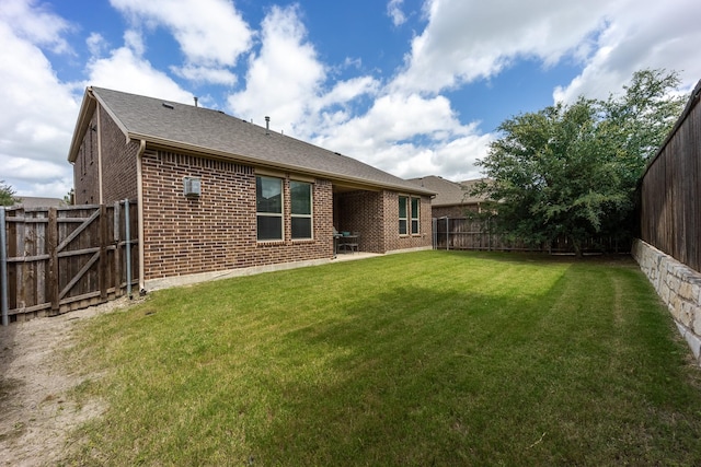 3508 Cooke Ln, Melissa, TX 75454 - back of property with brick siding, a fenced backyard, a patio area, and roof with shingles