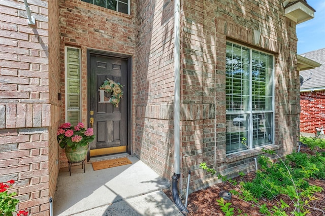 8508 Forsythia Dr, Mckinney, TX 75072 - view of exterior entry featuring brick siding