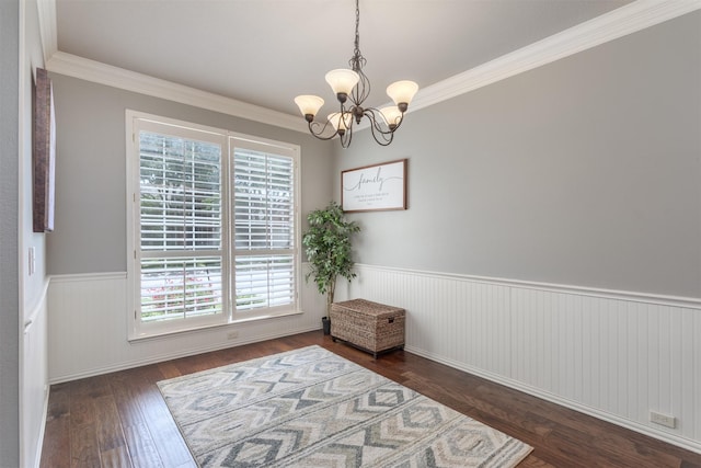 8508 Forsythia Dr, Mckinney, TX 75072 - spare room with a wainscoted wall, a chandelier, wood finished floors, and crown molding