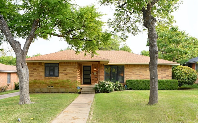 2542 Woodmere Dr, Dallas, TX 75233 - ranch-style home featuring brick siding and a front yard