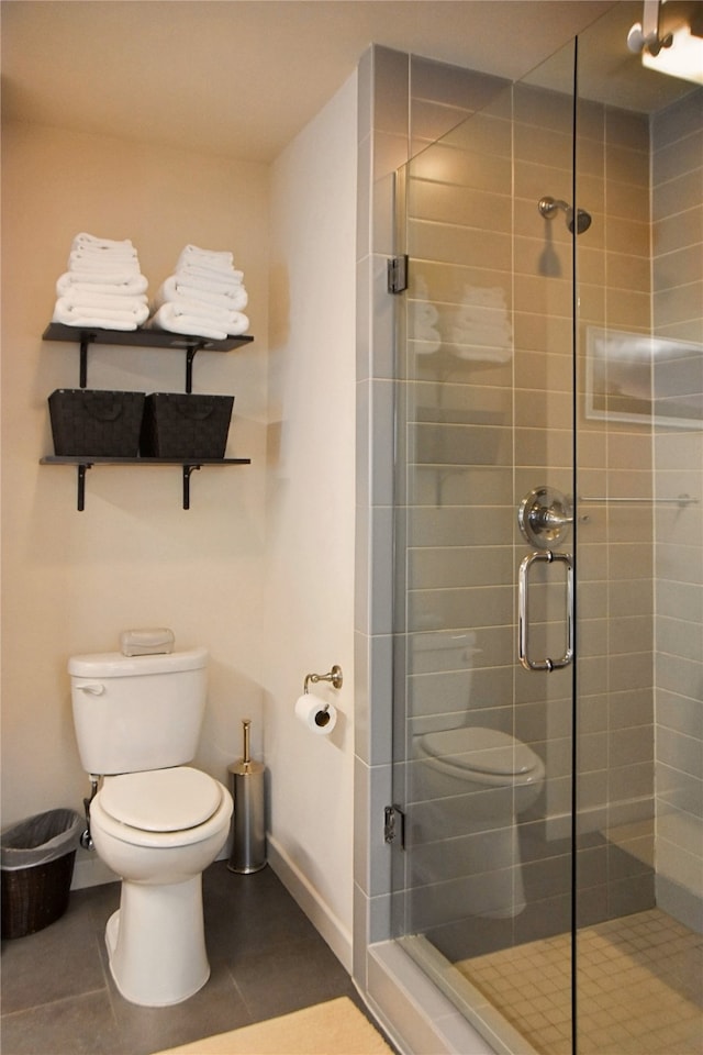 2542 Woodmere Dr, Dallas, TX 75233 - bathroom featuring a shower stall and tile patterned flooring