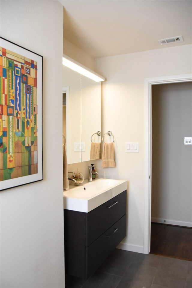 2542 Woodmere Dr, Dallas, TX 75233 - bathroom featuring vanity and tile patterned flooring