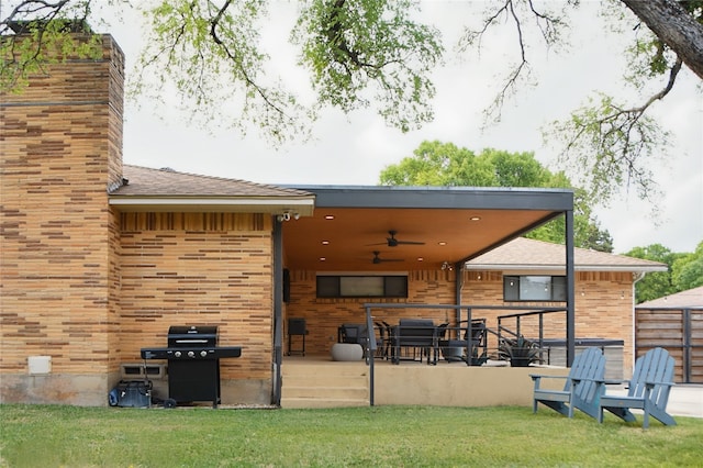 2542 Woodmere Dr, Dallas, TX 75233 - rear view of house with a ceiling fan, brick siding, a chimney, a patio area, and roof with shingles