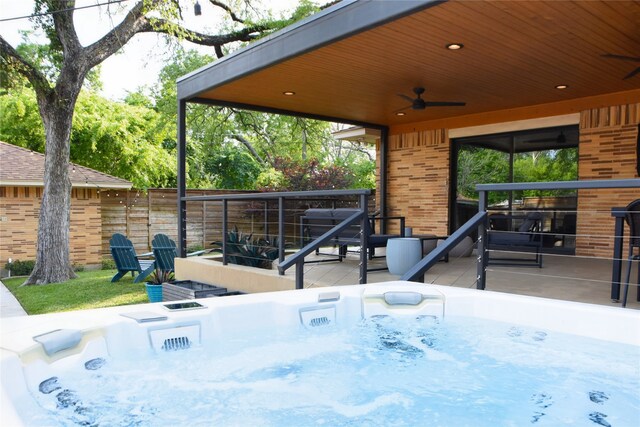 2542 Woodmere Dr, Dallas, TX 75233 - view of patio / terrace with a ceiling fan, a wooden deck, and a hot tub
