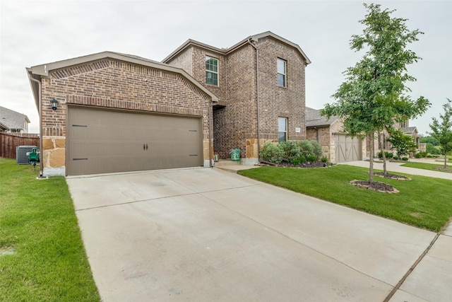 3913 Kylee Ln, Celina, TX 75009 - traditional home with brick siding, concrete driveway, and a garage