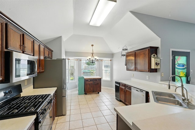 9212 Bedford Ln, Mckinney, TX 75071 - kitchen with appliances with stainless steel finishes, light tile patterned flooring, light countertops, vaulted ceiling, and a chandelier