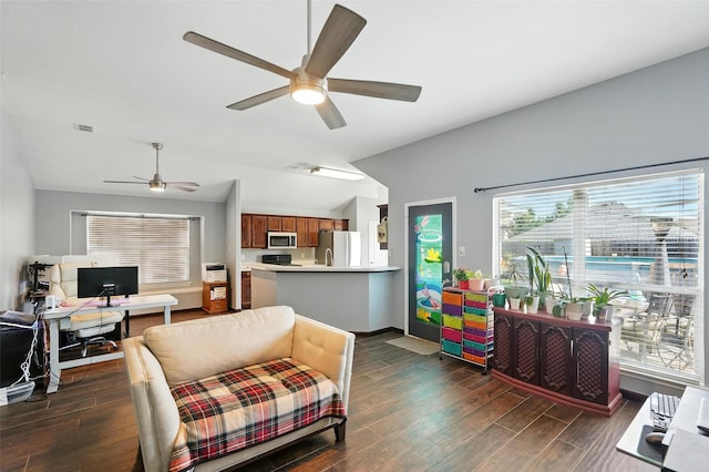 9212 Bedford Ln, Mckinney, TX 75071 - living area featuring a desk, ceiling fan, dark wood finished floors, and vaulted ceiling