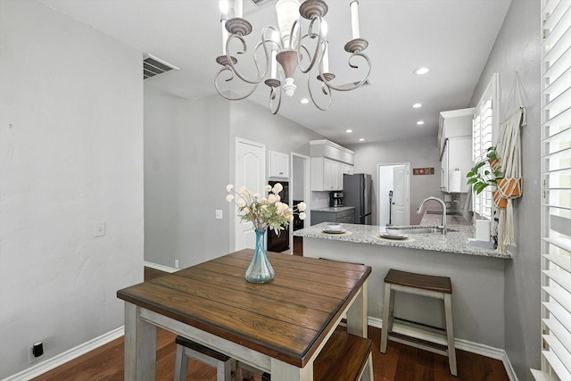 4321 Hazy Meadow Ln, Grapevine, TX 76051 - dining space featuring dark wood-style floors, a chandelier, and recessed lighting