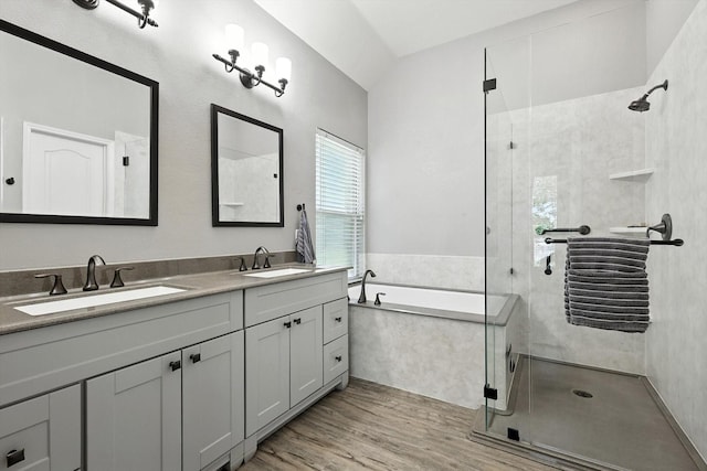 4321 Hazy Meadow Ln, Grapevine, TX 76051 - bathroom with a shower stall, a bath, double vanity, and wood finished floors