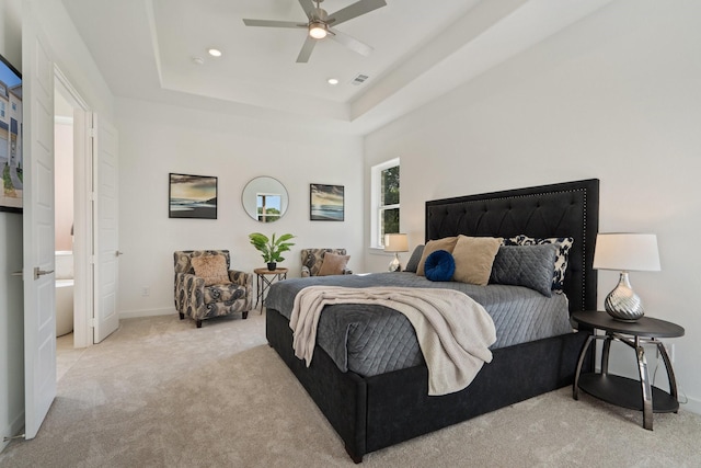 2142 Oak Haven Ct, Garland, TX 75044 - bedroom with light carpet, recessed lighting, a raised ceiling, and a ceiling fan