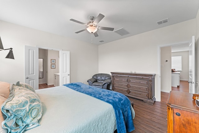 4917 Woodloch Dr, Princeton, TX 75407 - bedroom featuring dark wood finished floors, a ceiling fan, and connected bathroom