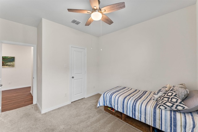 4917 Woodloch Dr, Princeton, TX 75407 - carpeted bedroom with baseboards and a ceiling fan
