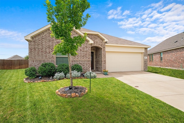 4917 Woodloch Dr, Princeton, TX 75407 - view of front of house featuring brick siding, a garage, and driveway
