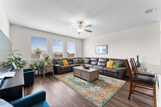 4917 Woodloch Dr, Princeton, TX 75407 - living area with ceiling fan and dark wood finished floors