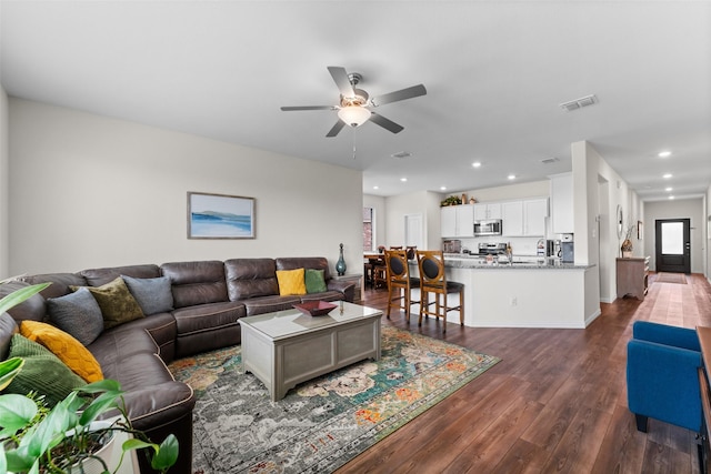 4917 Woodloch Dr, Princeton, TX 75407 - living area with a ceiling fan, dark wood-style flooring, and recessed lighting