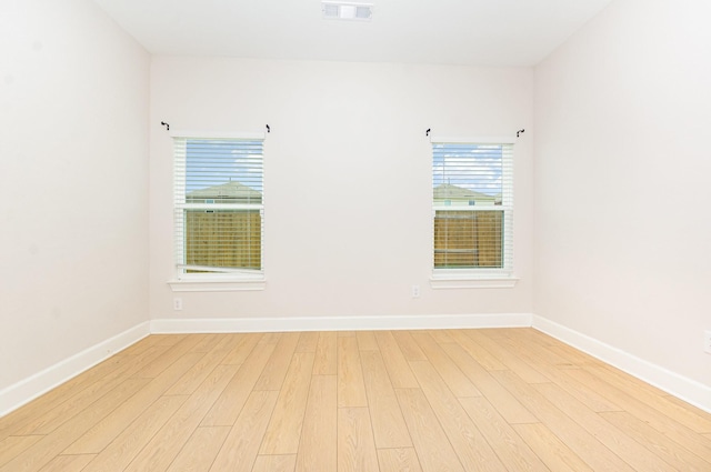 1103 Witherspoon Ln, Princeton, TX 75407 - spare room featuring wood finished floors and baseboards