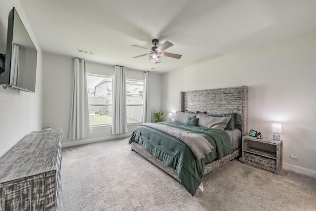 2420 Stella Ln, Northlake, TX 76247 - carpeted bedroom with baseboards and ceiling fan