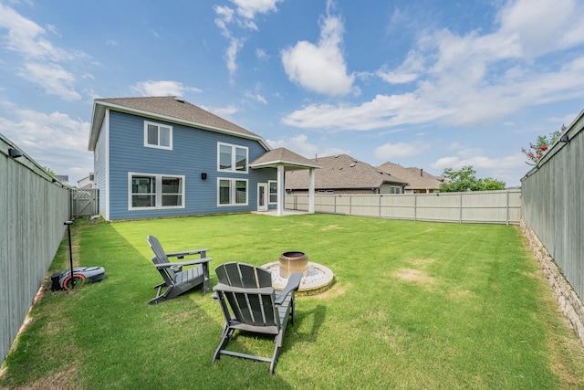 2420 Stella Ln, Northlake, TX 76247 - back of property featuring a fenced backyard and a fire pit