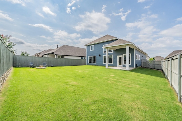 2420 Stella Ln, Northlake, TX 76247 - back of house with a fenced backyard, roof with shingles, and a patio