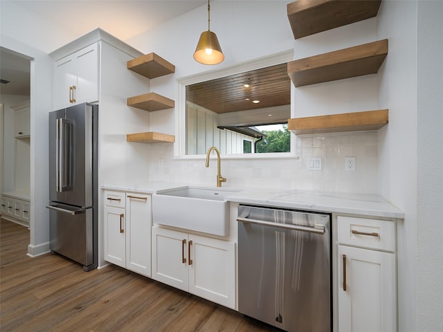 16652 Caeli Heights Ct, Winona, TX 75792 - kitchen featuring open shelves, appliances with stainless steel finishes, dark wood-type flooring, and decorative backsplash