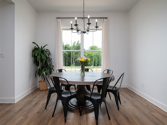 16652 Caeli Heights Ct, Winona, TX 75792 - dining area featuring a chandelier and wood finished floors