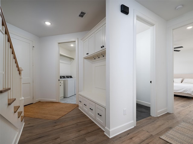 16652 Caeli Heights Ct, Winona, TX 75792 - mudroom featuring independent washer and dryer, wood finished floors, and recessed lighting