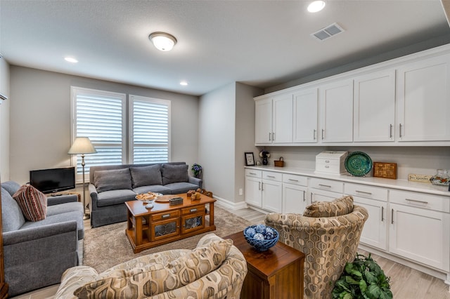 1116 Cornerstone Dr, Little Elm, TX 76227 - living area with light wood finished floors and recessed lighting