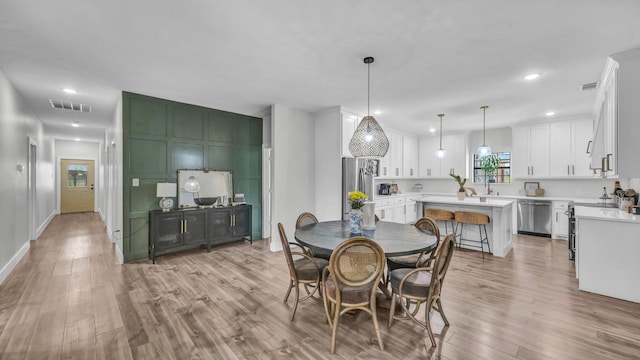 1381 County Road 1470, Chico, TX 76431 - dining room with light wood-style floors and recessed lighting