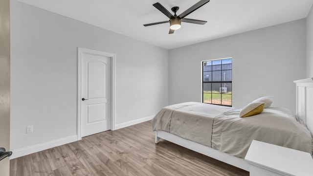 1381 County Road 1470, Chico, TX 76431 - bedroom with wood finished floors and ceiling fan