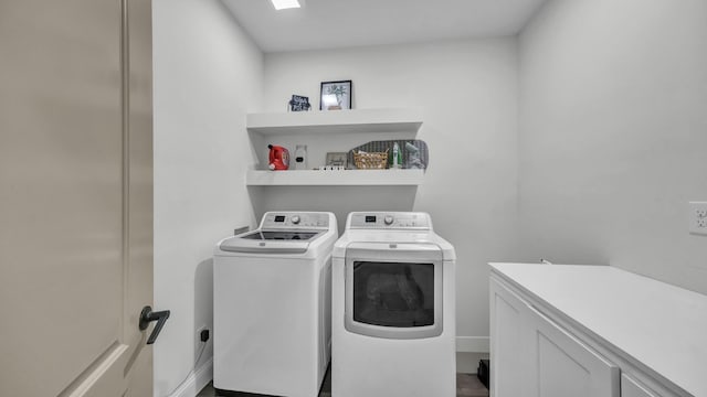 1381 County Road 1470, Chico, TX 76431 - laundry room featuring washing machine and dryer and cabinet space