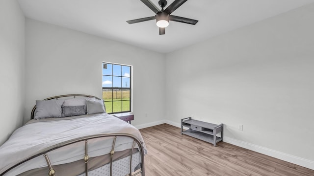 1381 County Road 1470, Chico, TX 76431 - bedroom featuring wood finished floors and a ceiling fan