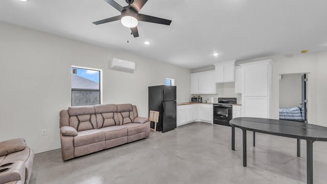 1381 County Road 1470, Chico, TX 76431 - living area featuring a wall mounted air conditioner, concrete floors, ceiling fan, and recessed lighting
