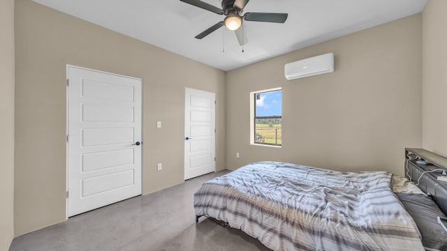 1381 County Road 1470, Chico, TX 76431 - bedroom with a wall mounted AC, finished concrete flooring, and ceiling fan