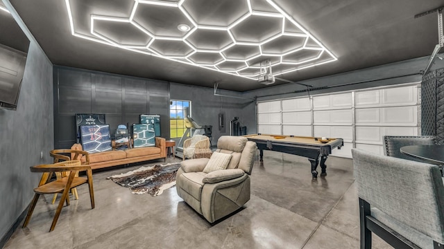 1381 County Road 1470, Chico, TX 76431 - game room with finished concrete floors, a garage, billiards, and electric panel