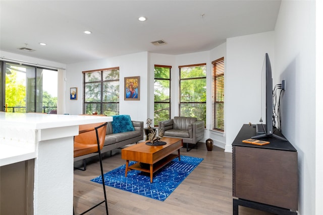 4333 Gilbert Ave Unit 330, Dallas, TX 75219 - living room with light wood-type flooring and recessed lighting
