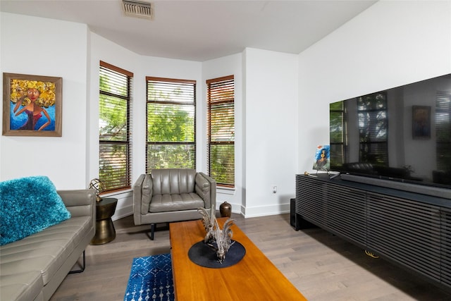 4333 Gilbert Ave Unit 330, Dallas, TX 75219 - sitting room featuring wood finished floors and baseboards