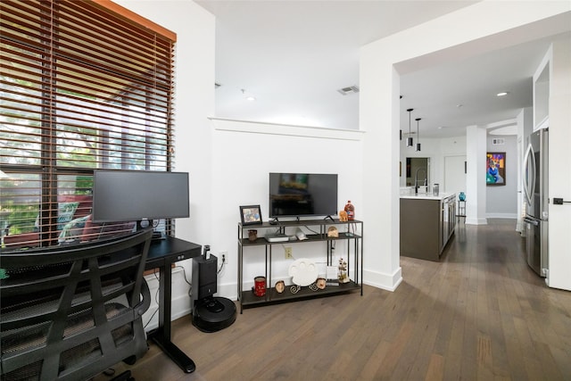 4333 Gilbert Ave Unit 330, Dallas, TX 75219 - living room featuring dark wood finished floors and baseboards