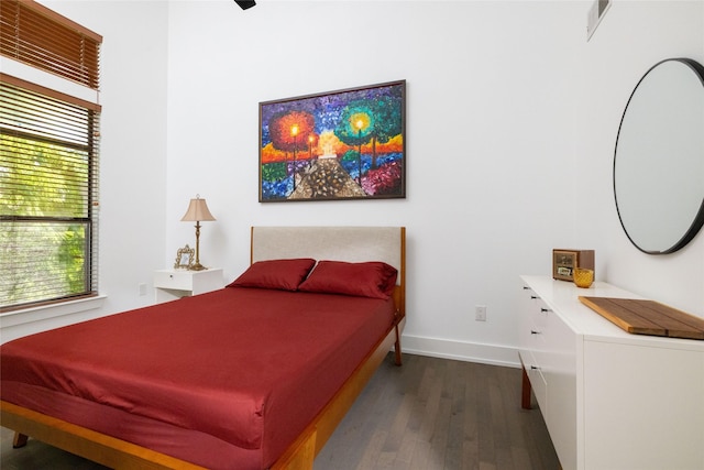 4333 Gilbert Ave Unit 330, Dallas, TX 75219 - bedroom featuring wood finished floors and baseboards