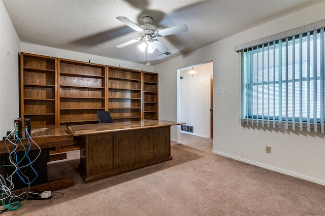 328 Bennett Cir, Desoto, TX 75115 - unfurnished office with light carpet, ceiling fan, and a textured ceiling
