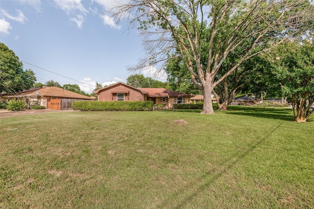 328 Bennett Cir, Desoto, TX 75115 - view of front of home with a front yard and a carport