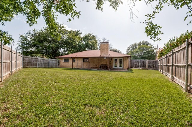 328 Bennett Cir, Desoto, TX 75115 - fenced backyard with a patio area