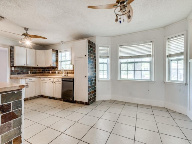 3836 Diamond Loch E, North Richland Hills, TX 76180 - kitchen featuring a ceiling fan, dishwasher, light tile patterned floors, decorative backsplash, and a textured ceiling